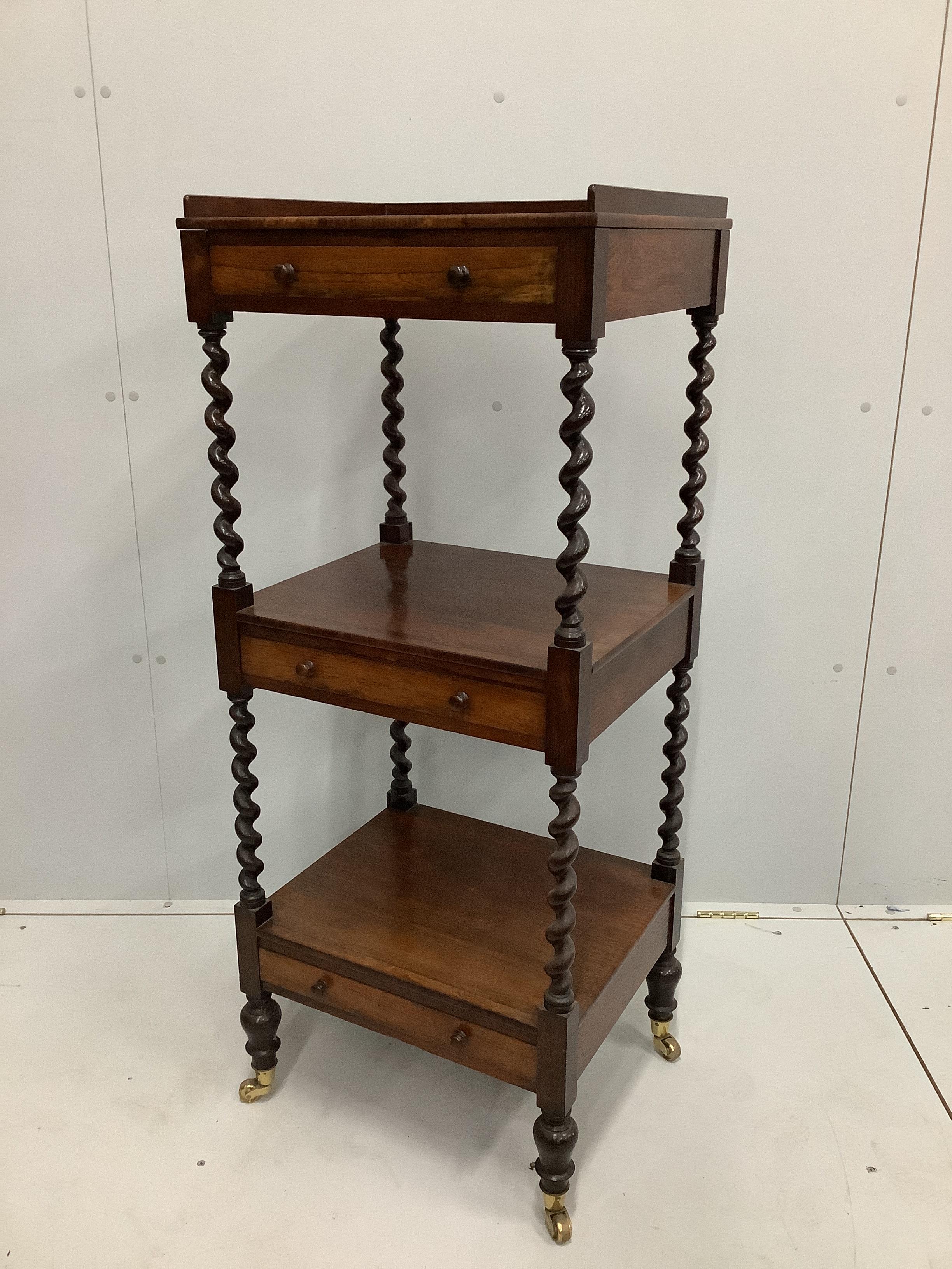 A Victorian rosewood three tier whatnot, width 48cm, depth 41cm, height 118cm